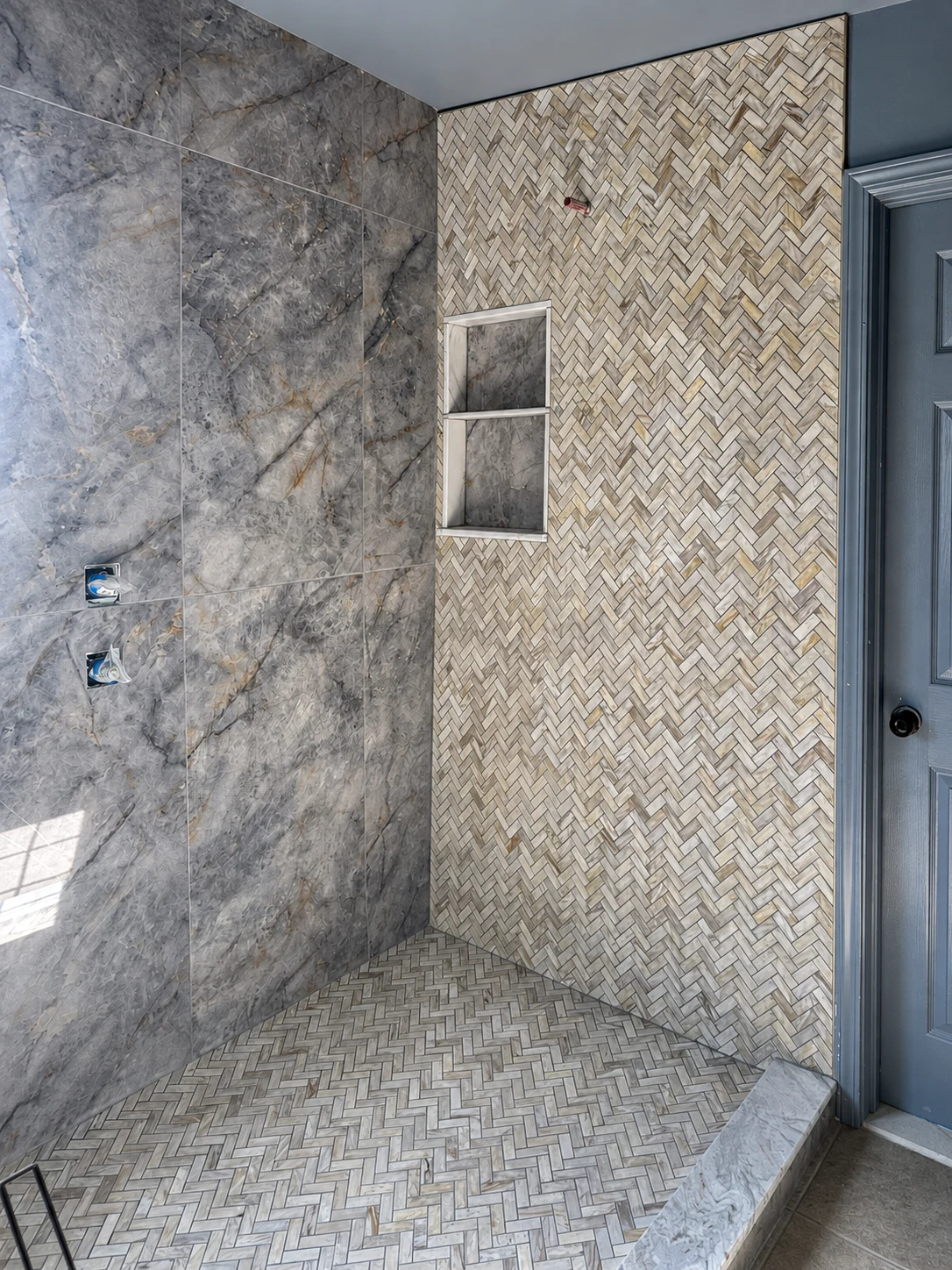 Master bath tile renovation by Paez And More